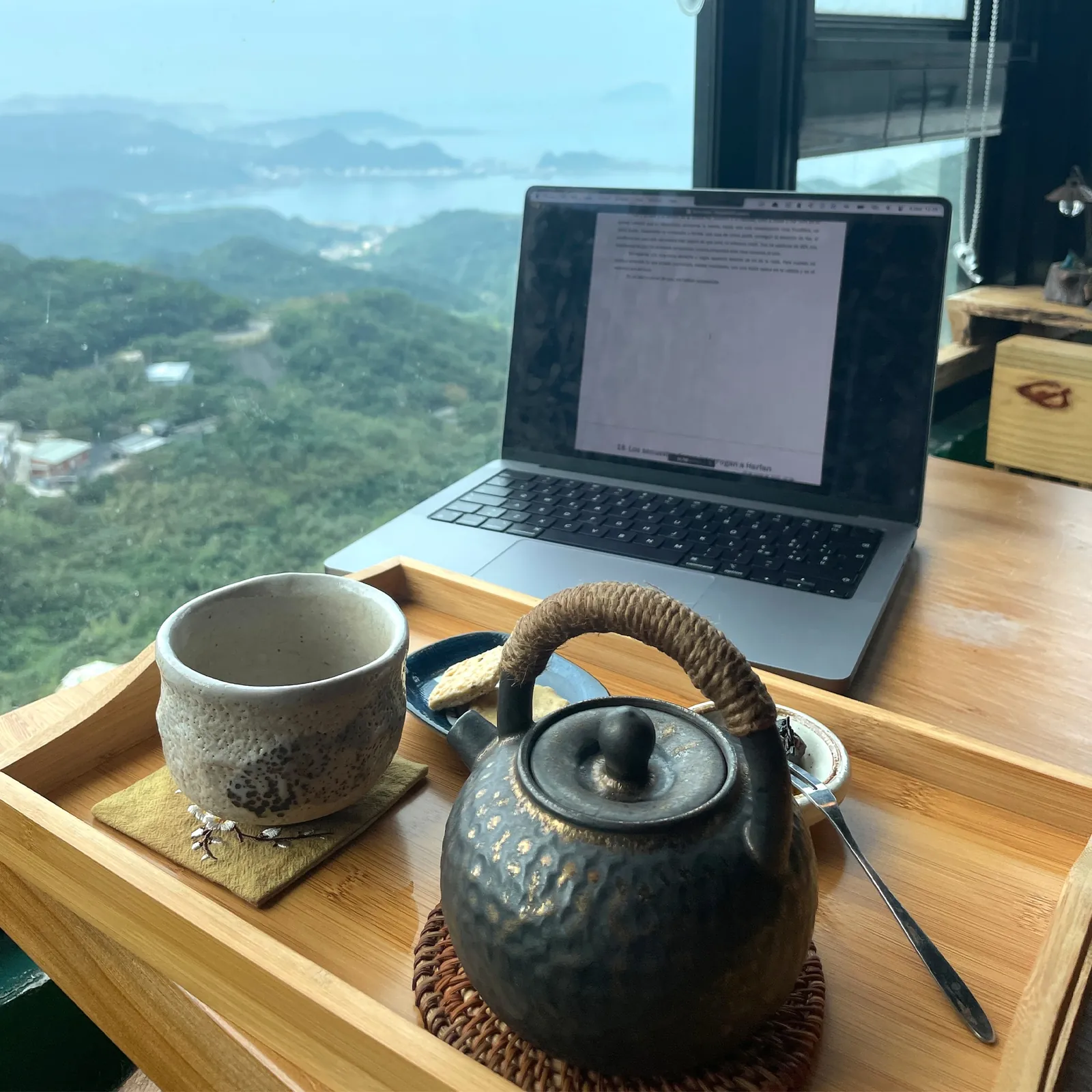 Kian Noren writing in a tea house in Taiwan